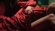 © stockbusters - Unknown woman wrapping red silk sheet. Girl touching herself through satin cloth
