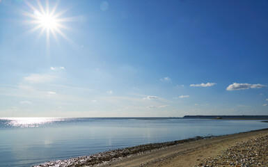 Wall Mural - sea, sky and clouds as background during the day, bright and beautiful