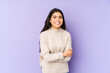 © Asier - Young indian woman isolated on purple background laughing and having fun.