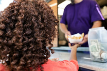 Food Truck: Woman Receives Order At Truck Window
