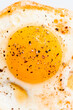© CWP, LLC/Stocksy - Sunny side up egg yolk closeup