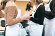© Sean Locke Photography/Stocksy - Class: Friends Have Wine During Cooking Class