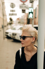 Street Portrait Of Beautiful Woman With Retro Sunglasses