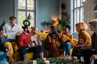 © Studio Firma/Stocksy - Christmas with Friends