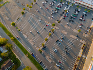 Wall Mural - Huge parking for cars near the shopping center from the air on the parking lot there are cars