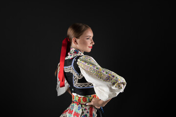 Beautiful woman wearing traditional Eastern Europe folk costumes. Slovak folk costumes.