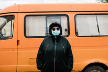 Senior Woman Wearing Disposable Mask Outdoors