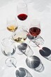 © Viktor Solomin/Stocksy - wine glasses with different types of wine