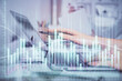 © peshkova - Multi exposure of woman hands typing on computer and financial graph hologram drawing. Stock market analysis concept.