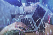 © peshkova - Double exposure of woman hands typing on computer and forex chart hologram drawing. Stock market invest concept.
