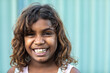 © Caro Telfer/Austockphoto - happy smiling 8 year old girl looking at camera