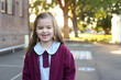 © Claire Bonnor/Austockphoto - Smiling school girl in playground