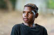 © Caro Telfer/Austockphoto - head and shoulders of one teenage boy with blurry background