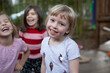 © Claire Bonnor/Austockphoto - Three pre-school friends laughing together