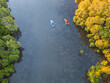 © Gary Chapman/Austockphoto - Looking down on kayakers paddling down a river between mangroves
