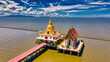 © Kridsadar - Chachoengsao / Thailand / April 06, 2017 : Wat Hong Thong. Beautiful Temple sitting on the sea. It clam your mind and bring a moment of peacefulness.