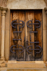 Wall Mural - wooden door and window of the traditional wooden and brick house in the authentic village