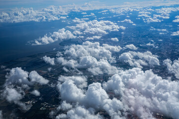 Aerial view landscape of Bangkok city in Thailand with cloud from aerial view airplane.