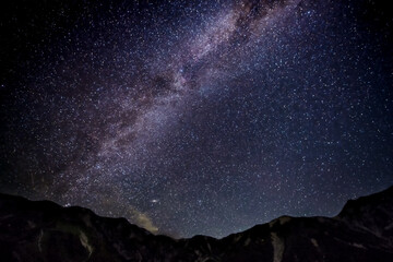 night sky with stars at mountains in tateyama, toyama japan