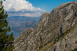 © Martina - Bay of Kotor from the heights. View from Mount Lovcen to the bay. View down from the observation platform on the mountain Lovcen. Mountains and bay in Montenegro. The liner near the old town of Kotor.