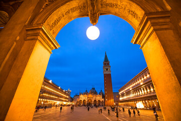 San Marco sqaure and Campanile tower in Venice at night, Italy