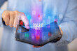 © ra2 studio - Young man holding a foldable smartphone with ONLINE TEST inscription, educational concept