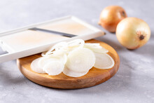 Fresh Chopped Onions On Wooden Cutting Board