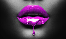 Purple Paint Dripping, Lipgloss Drops On Sexy Lips, Bright Liquid Paint On Beautiful Model Girl's Mouth. Lipstick. Make-up. Beauty Face Makeup, Close Up. Isolated On Black Background