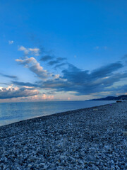 Amazing sunset over a tropical beach in Sochi.