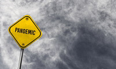 Wall Mural - Yellow pandemic sign with cloudy background