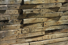 Stacked Wood Railroad Tie Retaining Wall Background