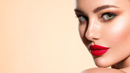 Wall Mural - beautiful white girl with a red lipstick on lips. stunning brunette girl with long black hair. close