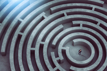 confused businessman thinks how to find the right way to exit from a big maze