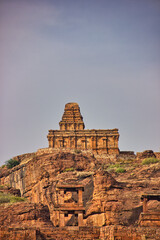 Wall Mural - Badami landscape with rocks and historical  Hindu and Jain cave temples. Town in the Bagalkot district in northern part of Karnataka, India.