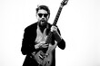 © SHOTPRIME STUDIO - man with guitar in hands musician rock star performance lifestyle light background