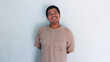 © BAGUS SATRIYA - asian fat man smilling pose