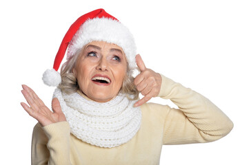 Portrait of smiling happy senior woman in Santa hat