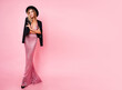 © Svetlana Sokolova - Full length image of  graceful sexy blonde woman in sequin maxi dress and stylish black hat posing on pink background . Amazing figure.  Height heels. Shopping . Fashionable look. Space for text.