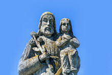 Saint Joseph With Little Jesus Christ. Very Ancient Stone Statue.