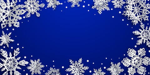 Christmas background with volume paper snowflakes with soft shadows on blue background