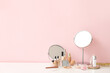 © Pixel-Shot - Set of decorative cosmetics and mirrors on dressing table
