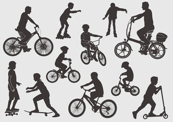 Silhouette of a bicyclist. Girls on the rollers. A boy on a skateboard. The boy on the scooter