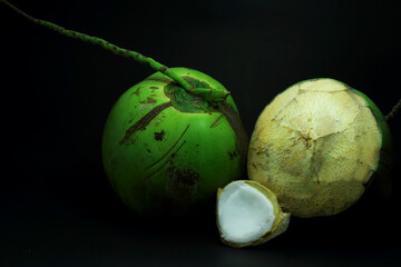 Art background coconut, banana, spoon, dish