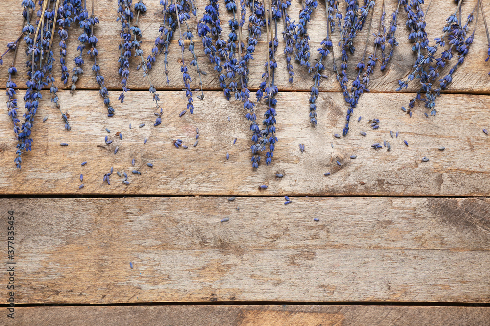 Beautiful lavender flowers on wooden background