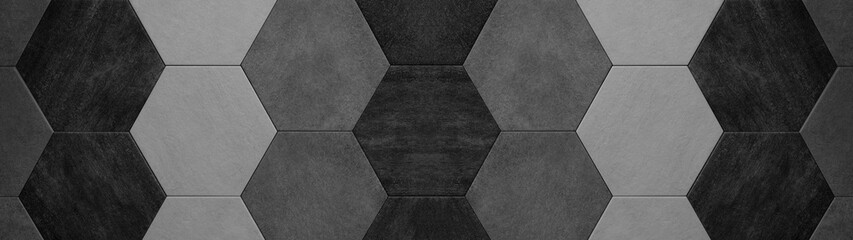 Abstract seamless dark black gray grey anthracite concrete cement stone tile wall made of hexagonal geometric hexagon print texture background banner panorama