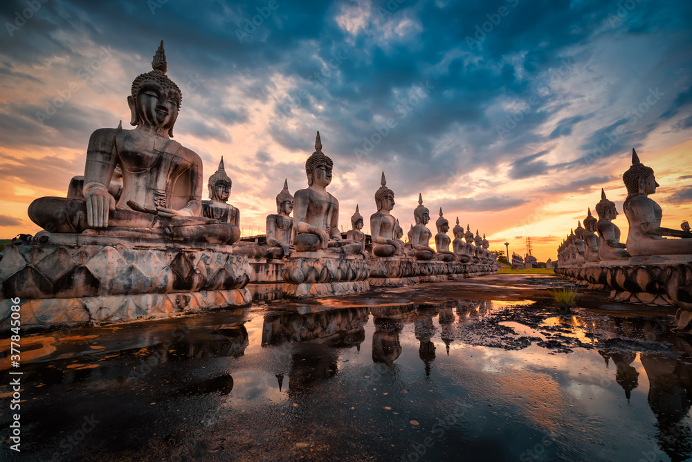 Many Statue buddha image at sunset in southen of Thailand Stock Photo ...