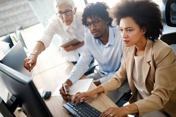 Wall Mural - group of successful business people at work in office