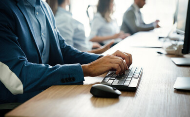 Programmers cooperating at IT company developing apps