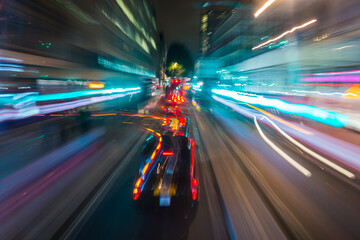 Abstract of light trails from traffic and buildings in the city of London