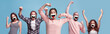 © master1305 - Group of winning, happy people, women and men wearing protective face mask on blue background. Multiracial models. Collage. Concept of human emotions, facial expression, safety, protection.